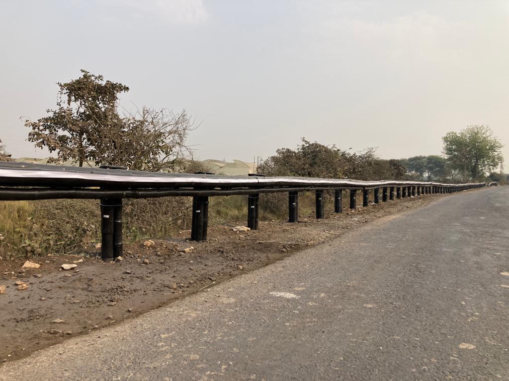 Kooch Kavach bamboo crash barrier installed roadside